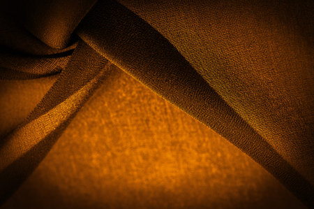 Dark sepia brown-yellow chiffon silk is a soft transparent fabric with a slight roughness (matte,...