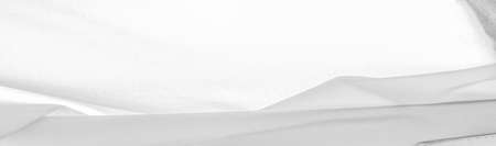 White silk, smooth elegant white silk or luxurious satin fabric texture can be used as a wedding background. Luxury background design. texture, patternの写真素材