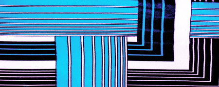 silk fabric with a blue-violet pattern in white stripes. Poncho with Mexican motives. texture,...