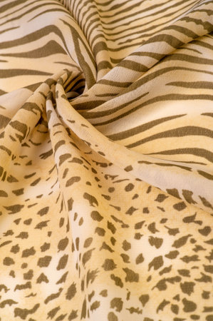 silk fabric in brown and white stripes, zebra skin in African style. Repeating striped background texture. For the designer, the sketch of the layout, the entourage of the decorator.の写真素材