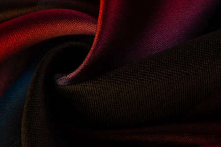 The silk scarf is dark in color. Green red blue blurred stripes. Delicate long gradient color stole, soft hand feeling, stylish and comfortable. The scarf will add sophistication to your look.の写真素材