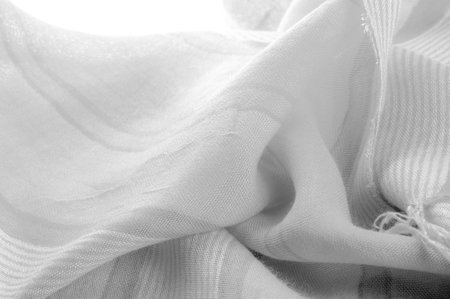 Monochrome gray silk fabric, Texture. Background. a photograph or picture developed or executed in...