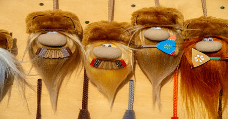 Texture, background, pattern, folk art, funny Russian men with beards and mustaches. Toy doll