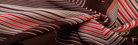 silk fabric, brown background with striped pattern of white and red lines, spanish theme, texture,...