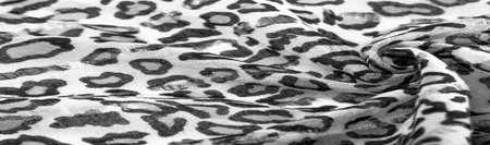 silk fabric black and white with leopard print. Lightweight silk with leopard print will perfectly...