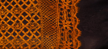 brown lace fabric, combination of amber with black fabric. amber, texture, background, pattern.