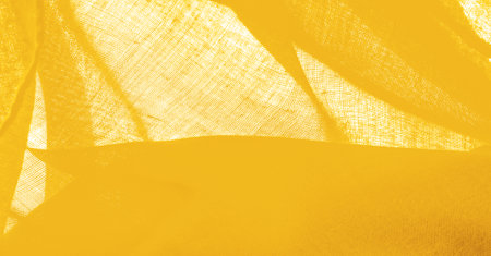 Yellow fine-grained tissue. Velvet texture of yellow silk felt. Texture background. Background fabricの写真素材