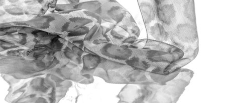 monochrome silk fabric, cheetah skin, african savannah theme. Background texture, pattern