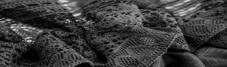 black lace fabric, sexy retro negligee material. Vintage lingerie ornament. background texture, pattern.の写真素材
