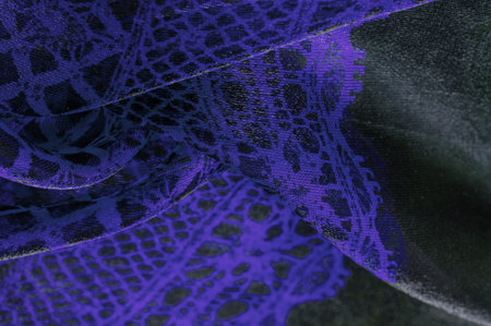 blue lace fabric, a combination of blue with black fabric. blue, sapphire, azure, texture, background, pattern.の写真素材