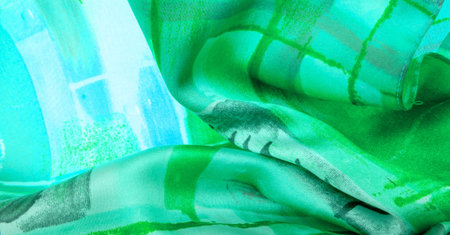 green fabric with abstract pattern, print of branches with flora leaves. Background texture....