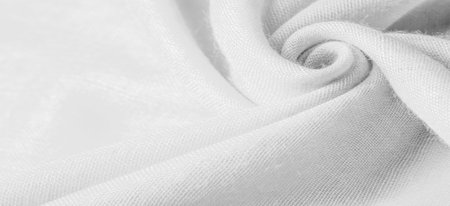 Silk fabric in white. Grunge surface texture with fine grains, dots, abstract background. Monochrome...