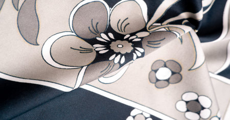Black silk fabric with a print of white flowers, geometric lines. perfect for adding sophistication...