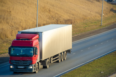 Freight road transportation. This is the physical process of transporting goods by road. loaded, unloaded, cross-trading and cabotage. transit traffic. Russia Chelny 05 11 2020のeditorial素材