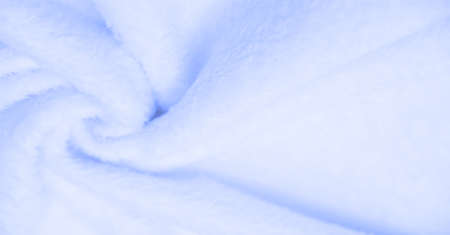 Velvet. Plush. Pale Blue. (from the French peluche) - textiles with a short pile or nap, the same as fustian or velvet. Blue animal fur texture background, texture of plush fluffy fur close-up.の写真素材