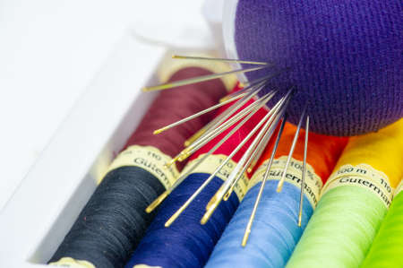 A thread is a continuous strand (made of fibers or threads twisted together), a long, thin strand of cotton, nylon, or other fibers used in sewing or weaving. 20 11 2020 Russia Chelnyのeditorial素材