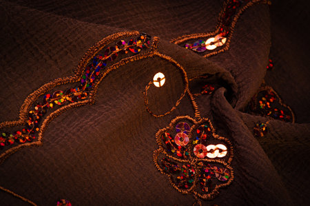 Silk brown. Fabric embellished with sequins. This unique textile has a beautiful elastic velvet...