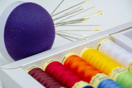 A thread is a continuous strand (made of fibers or threads twisted together), a long, thin strand of cotton, nylon, or other fibers used in sewing or weaving. 20 11 2020 Russia Chelnyのeditorial素材