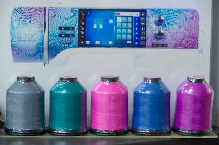 A thread is a continuous strand (made of fibers or threads twisted together), a long, thin strand of cotton, nylon, or other fibers used in sewing or weaving. 20 11 2020 Russia Chelnyのeditorial素材