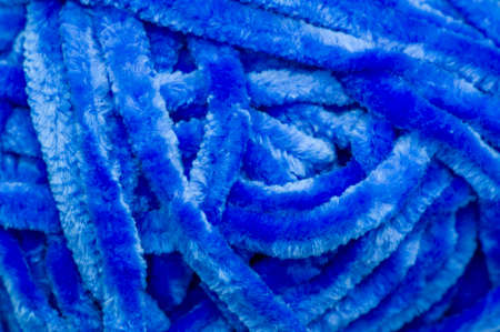 Sewing products. A roll of blue wool yarn. This yarn has a great color and is suitable for crocheting, knitting and weaving.の写真素材