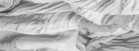 silk fabric, large stripes of white and gray, separated by a stripe of silver, background texture pattern, ornament,の写真素材
