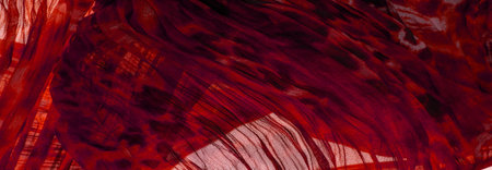 Red cloth. Silk fabric in fine organza with panther print, Crumpled texture. Background. Template.の写真素材