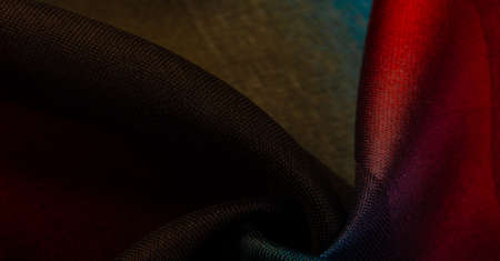 The silk scarf is dark in color. Green red blue blurred stripes. Delicate long gradient color stole, soft hand feeling, stylish and comfortable. The scarf will add sophistication to your look.の写真素材