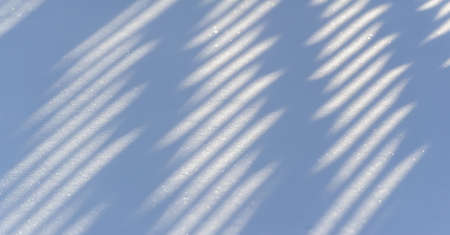 Snow texture atmospheric water vapor frozen into ice crystals and falling in light white flakes or lying on the ground as a white layer.の写真素材