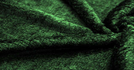 Velvet. Plush. Deep euirid green. fabric with an even pile, longer and less dense than velvet. Expensive or spectacularly luxurious. luxuriously furnished, rich, dearの写真素材