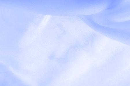 Blue pale silk fabric, smooth elegant blue silk or luxury satin fabric, texture as a wedding background. Luxury background design. Retro style.の写真素材