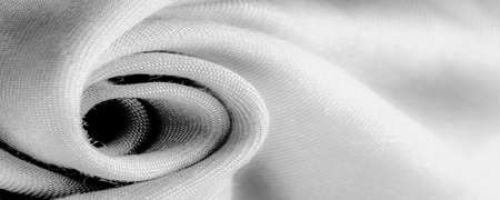 white fabric, twill. Thin fabric with diagonal weaving of threads. From Latin and French, the name of the material is translated Textureの写真素材