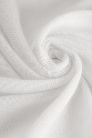 White cloth. abstract background of luxury fabric or liquid silk texture of waves or wavy folds. background or elegant wallpaper design. Cotton texture, natural fabric and dyeの写真素材