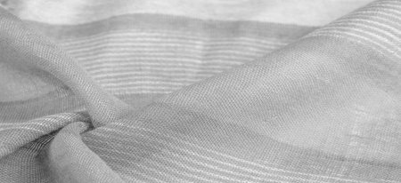 gray-white fabric with white stripes, it is a bold and bright fabric for your projects. With many...