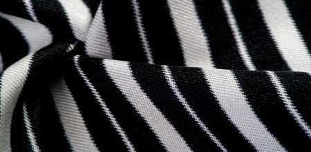silk fabric with stripes. black and white stripes. for holiday gift box, postcard banner, present decoration, packaging designの写真素材