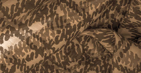 sandy sepia yellow silk fabric, abstraction, copyright print, military camouflage fleece fabric, your designs will allow you to be military, Background design texture,の写真素材