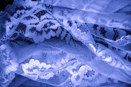 Blue lace. Unique design Handmade black and white stretch lace. Accessories. Elegant, calm, naive fabric. Jacquard. High quality customized handmade accessories. Lingerie fabricsの写真素材