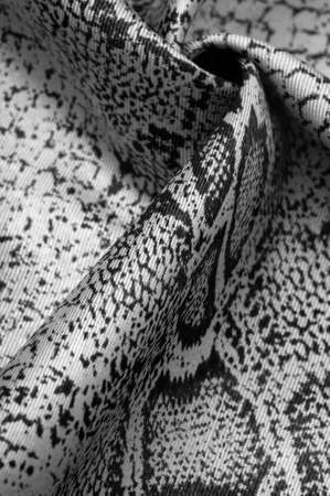 fabric with a pattern of gray snake skin, African fabric, design photo - safari in the country of Africa. Texture, backgroundの写真素材