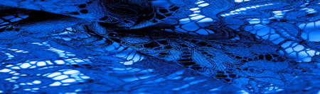 blue lace fabric, delicate embossed lace fabric, scalloped on both edges. Suitable for your projects, design, etc. Texture, backgroundの写真素材