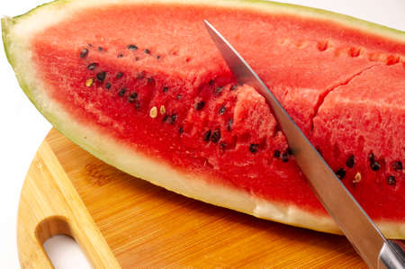 Watermelon Slices. the large fruit of a plant of the gourd family, with smooth green skin, red pulp, and watery juice Photo of food.の写真素材