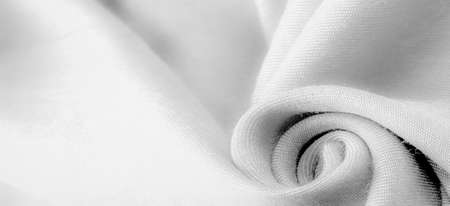 white fabric, twill. Thin fabric with diagonal weaving of threads. From Latin and French, the name of the material is translated Textureの写真素材