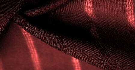 simple red fabric with lines. The lines formed by the extraction of the thread, Texture, backgroundの写真素材