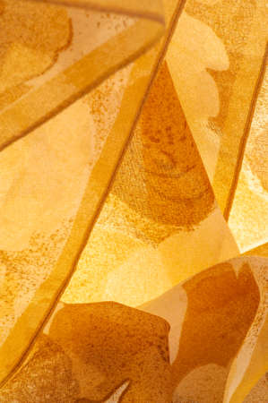 Abstract yellow silk chiffon fabric. Milk-colored taffeta silk fabric artistic layout. Texture. background. template.の写真素材