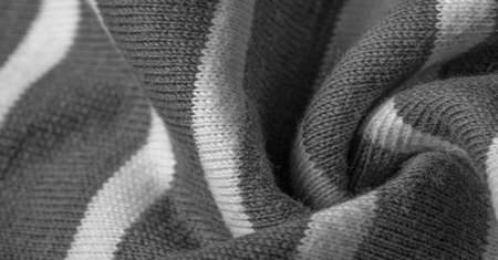 fabric from gray and white woolen stripes, woolen knitwear, which is elegant and pleasant to work with. Great for your projects. Texture, designの写真素材