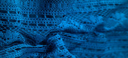 Blue knitted lace triangular scarf, shawl, autumn winter scarf, hood, wedding accessories Project ideas, designer fashion accessor. texture, backgrounの写真素材