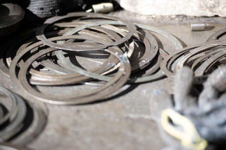 Industrial photography. Aesthetics of mechanical products made of ferrous metals. Work on displaying the interior, exterior of industrial facilities; Gear bushing and other auto parts.の写真素材