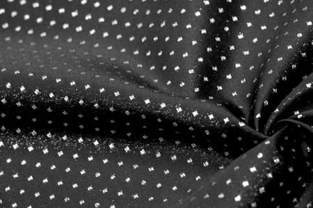 Brocade is golden in color. into a little polka. Brocade is a class of ornate shuttle fabrics, often made from colored silk with gold and silver threads. An important fabric in the Renaissanceの写真素材