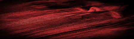 Crepe deep red, is a fabric of silk, wool or synthetic fibers with a distinctly clear, crimped appearance. Texture, background, patternの写真素材