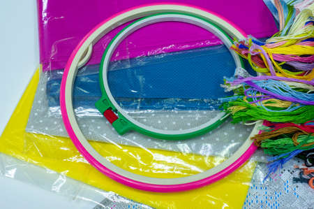 Hoops and frames are tools used to keep fabric taut while working with embroidery or other forms of needlework.の写真素材