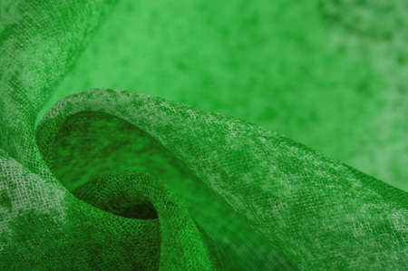 Abstract green silk chiffon fabric. Art mockup of spring green color taffeta silk fabric. Texture. background. template.の写真素材