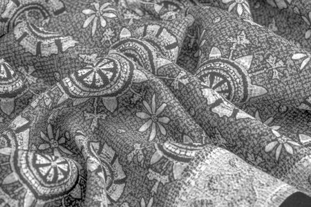 black and white, silk fabric with white drawings of flowers circles. Charmeus has a beautiful...